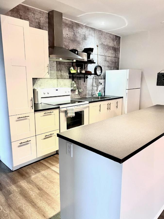 Sutton - Condo Au Coeur Du Village Екстер'єр фото
